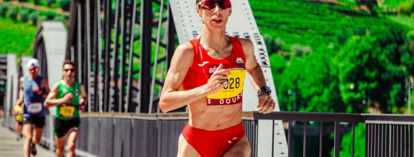 Woman Running on Bridge