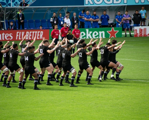 rugby team dancing in the field