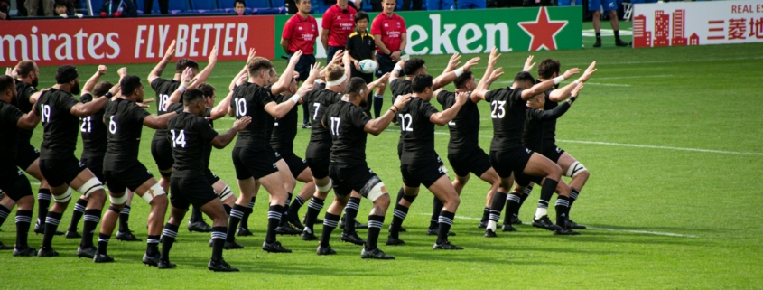 rugby team dancing in the field