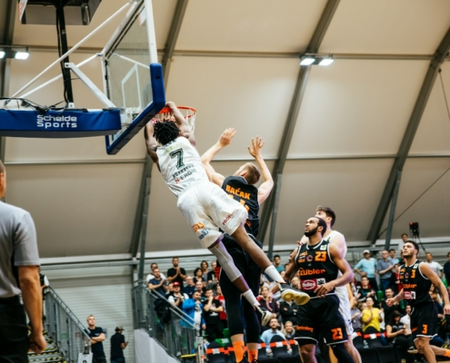 men playing basketball