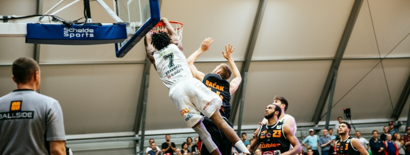 men playing basketball