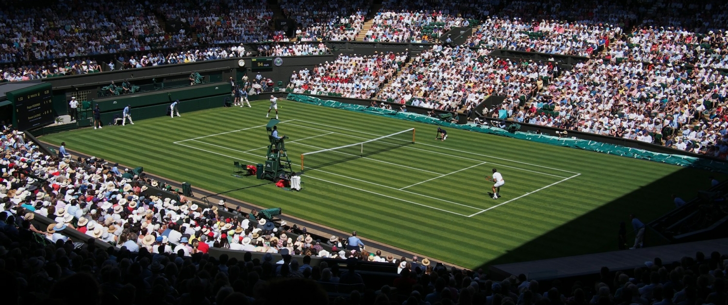 two person playing tennis