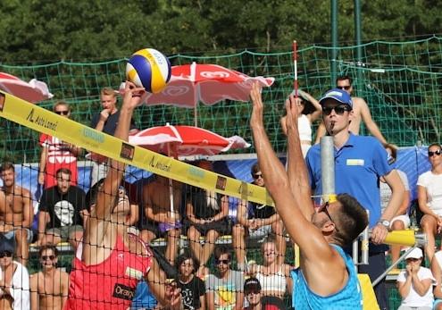 people playing volleyball during daytime