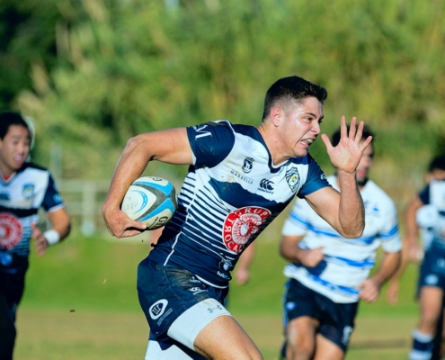 team playing rugby sport