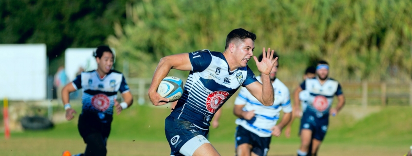 team playing rugby sport