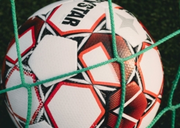 Close-up of a Soccer Ball in the Goal