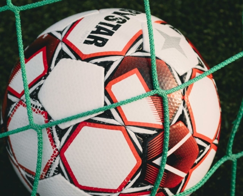 Close-up of a Soccer Ball in the Goal